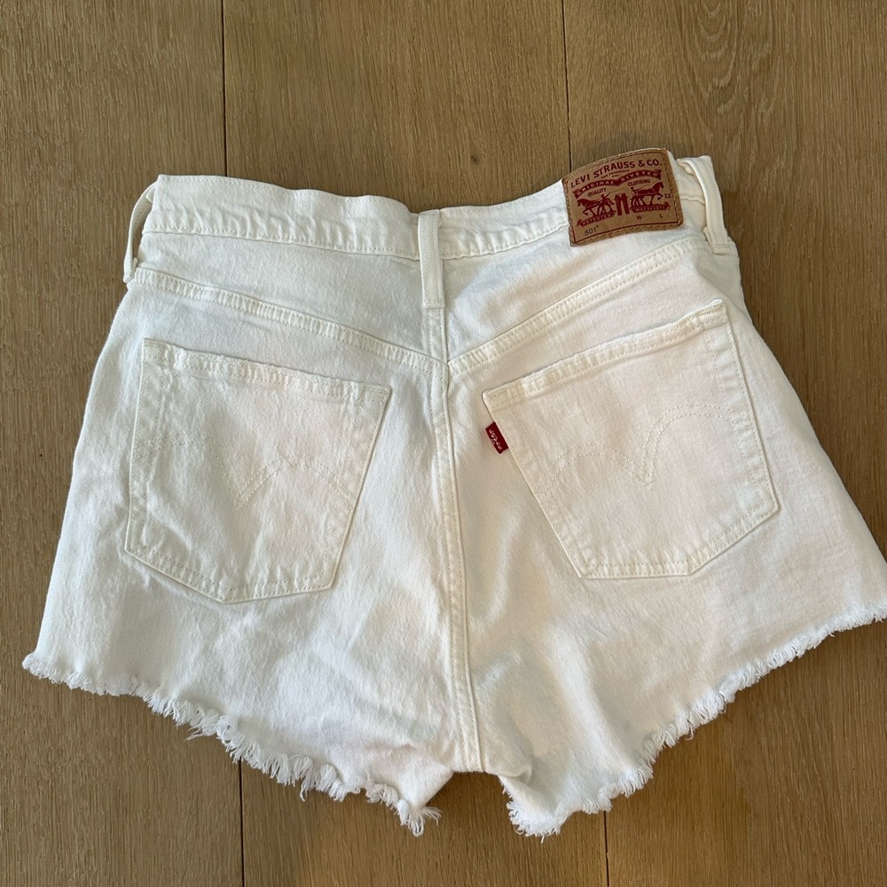 Levi's White Denim Cutoff Shorts with Frayed Hem